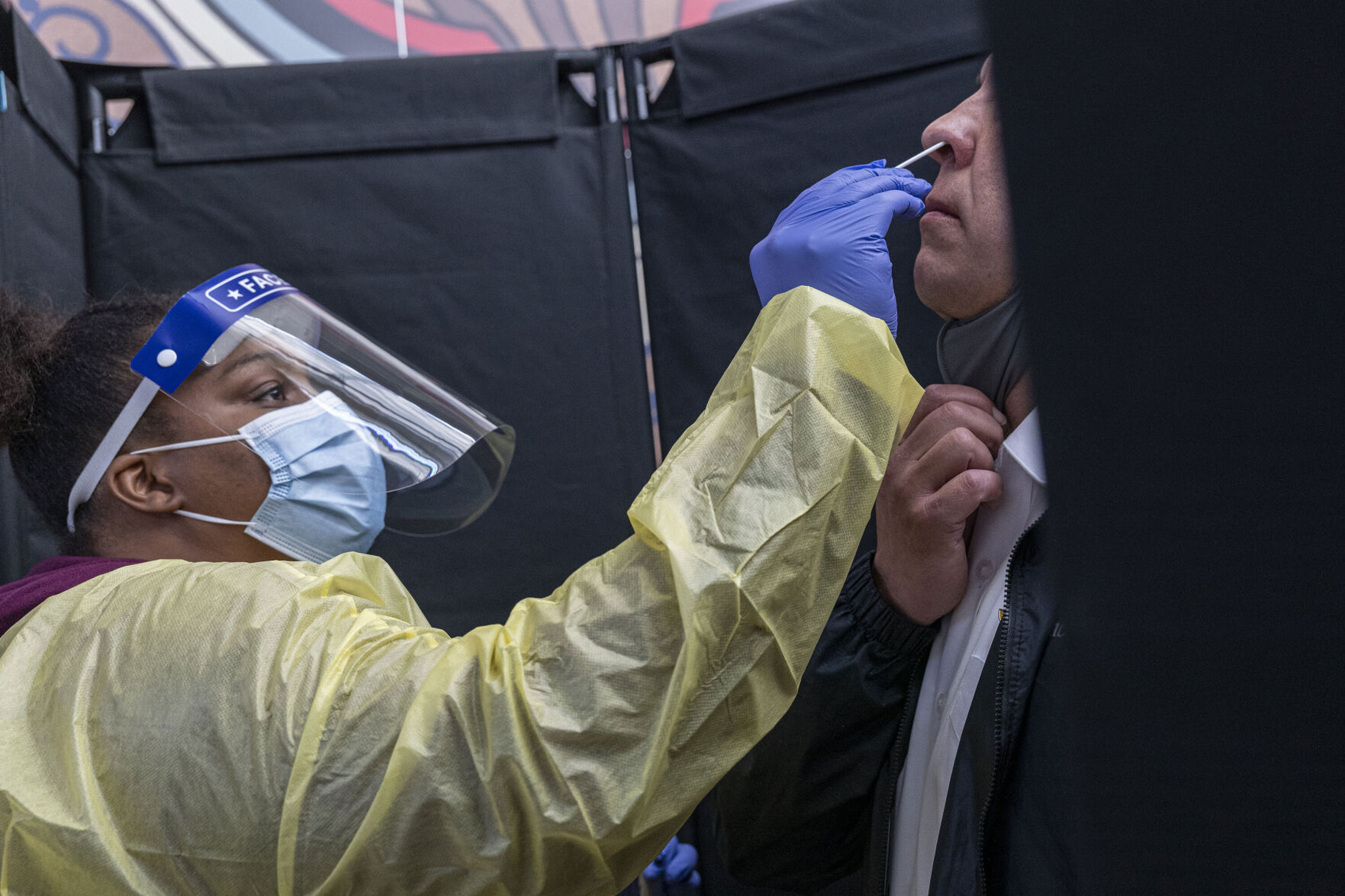 How long should you isolate if you're fully vaccinated but have Covid-19? There is some debate